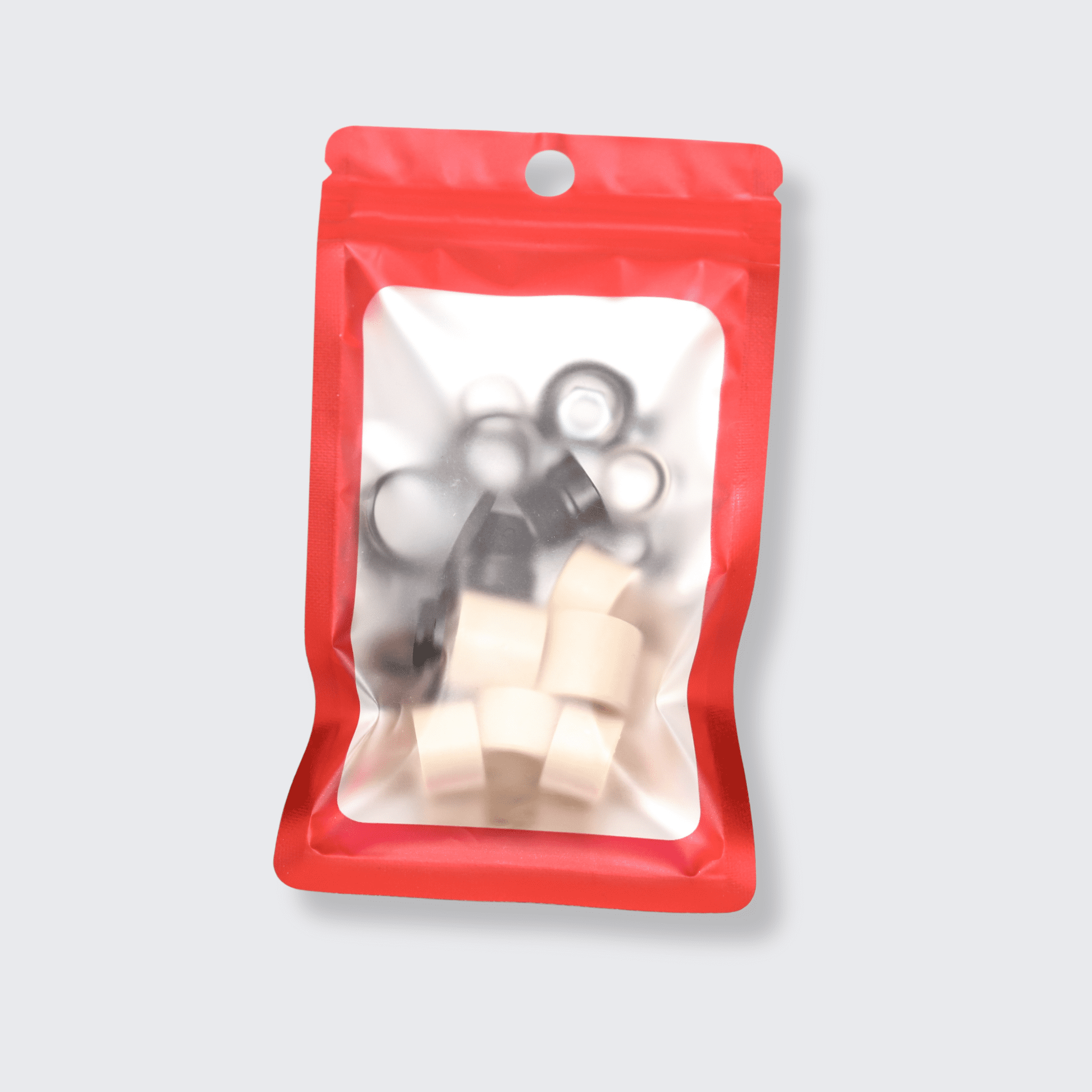 Pedal REMfresh Kit Pieces in red product baggie.